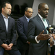 The Rev. Jamal Bryant of Empowerment Temple speaks as Ben Jealous (left) of Southern Elections Fund and Todd Yeary of the Maryland NAACP listen during a news conference June 8, 2015, in Baltimore.
Alex Wong/Getty Images
